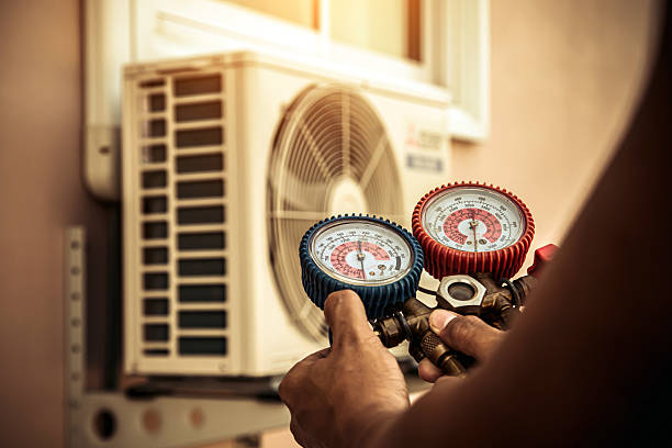 Professional Air Conditioning Service technician working in Parkville, PA